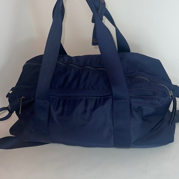 lululemon athletica Handbags - Lululemon dark gym bag great condition 4 zippers